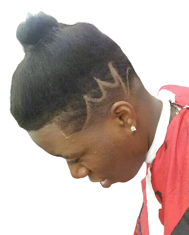 Freehand custom hair design carved into an undercut with a blended fade, by JJ at Hair Affair Barbershop in Tarpon Springs, FL